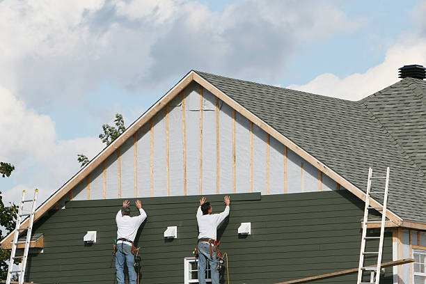 Professional Emergency Siding Repair technician working in Penfield, PA